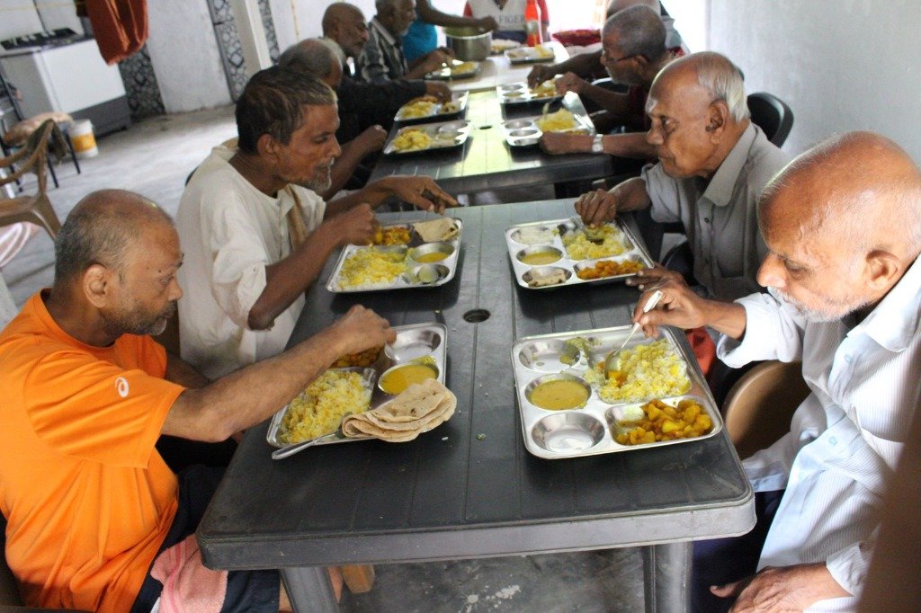 Seniors enjoying fresh Satvik meals together at Brahmand Senior Home